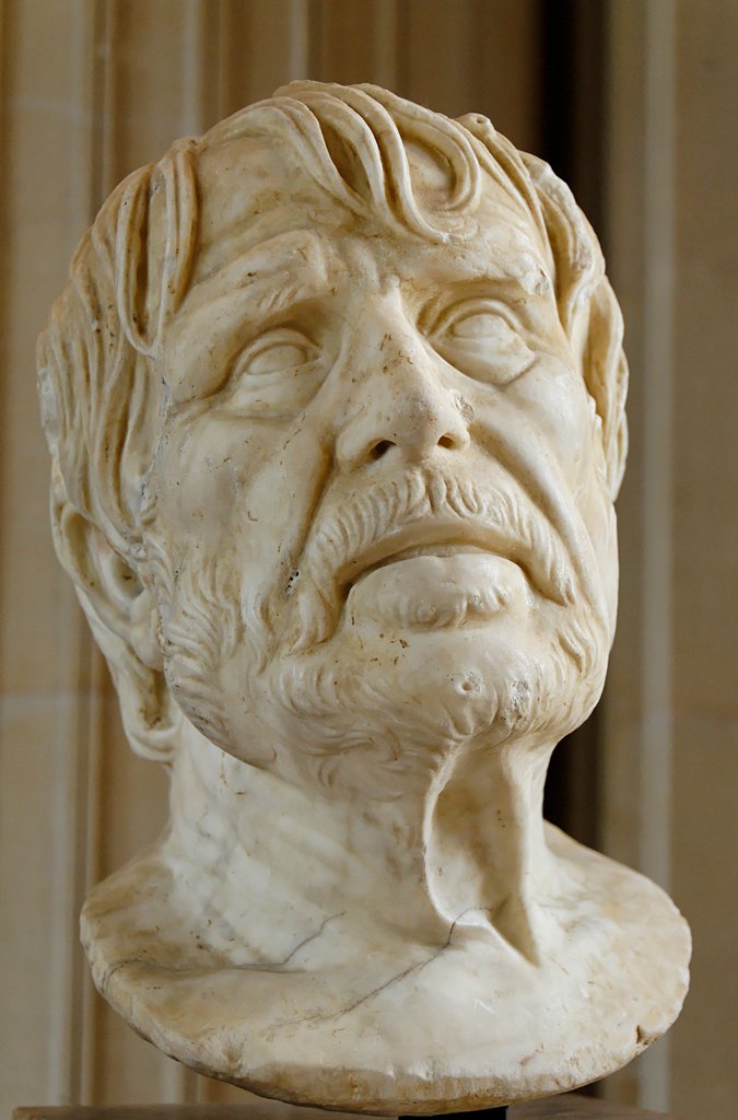 Retrato atribuído do poeta Hesíodo, durante muito tempo considerado o busto de Séneca, daí o nome de "pseudo-Séneca". Mármore, descoberto no leito de um rio em Auch.