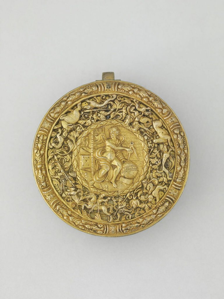 Relógio em forma de tambor, em aço e latão, caixa parcialmente vazada, moldada e cinzelada, Alemanha, por volta de 1550